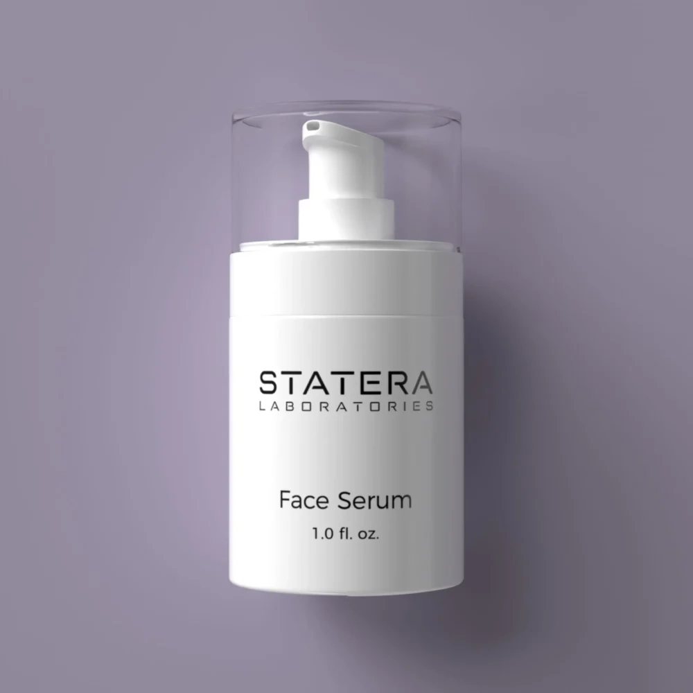 STATERA Laboratories Face Serum 1.0 fl. oz front perspective with violet background on mobile devices.